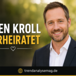 Sven Kroll smiling during a television presentation while discussing current events on a German TV program.